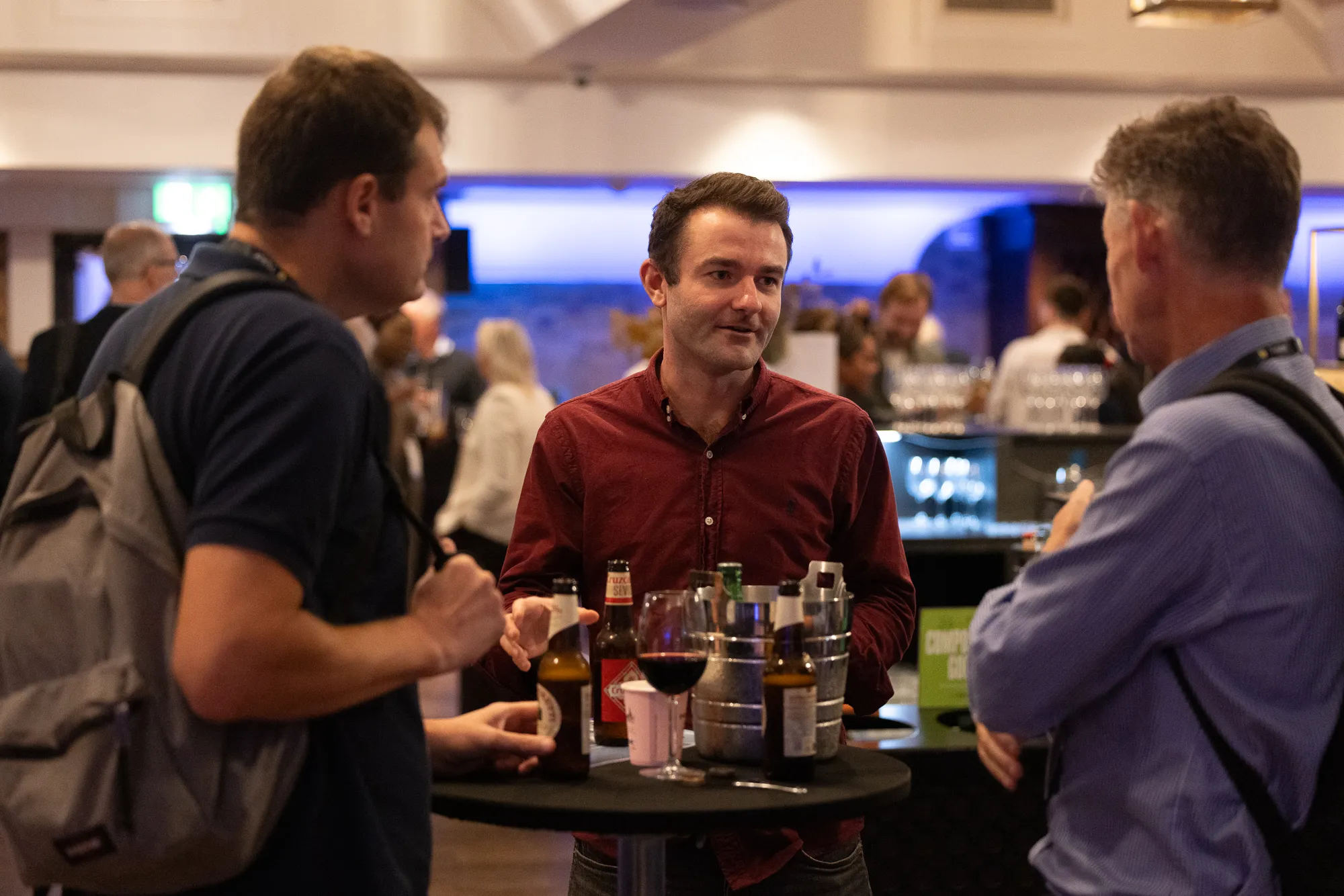 Delegates networking at the Investor Summit bar