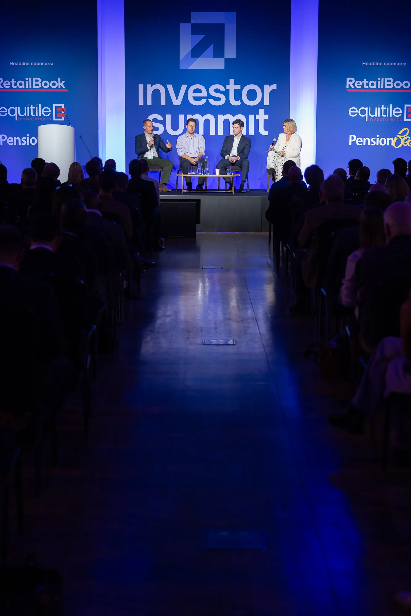 The main stage seen down the aisle of a full audience